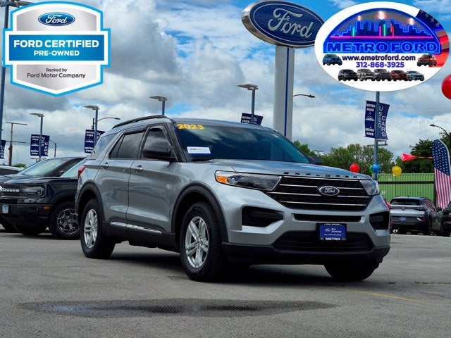 2023 Ford Explorer XLT in Iconic Silver Metallic — front three-quarter view