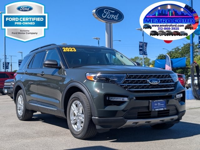 2023 Ford Explorer XLT in Forged Green Metallic — front three-quarter view