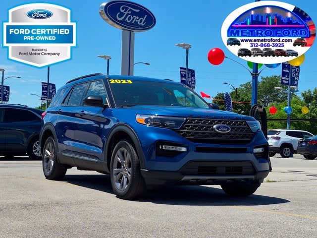 2023 Ford Explorer XLT in Atlas Blue Metallic — front three-quarter view